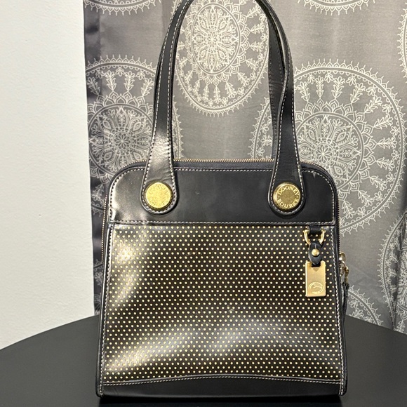 Dooney & Bourke Handbags - Dooney & Bourke Perforated Leather Handbag